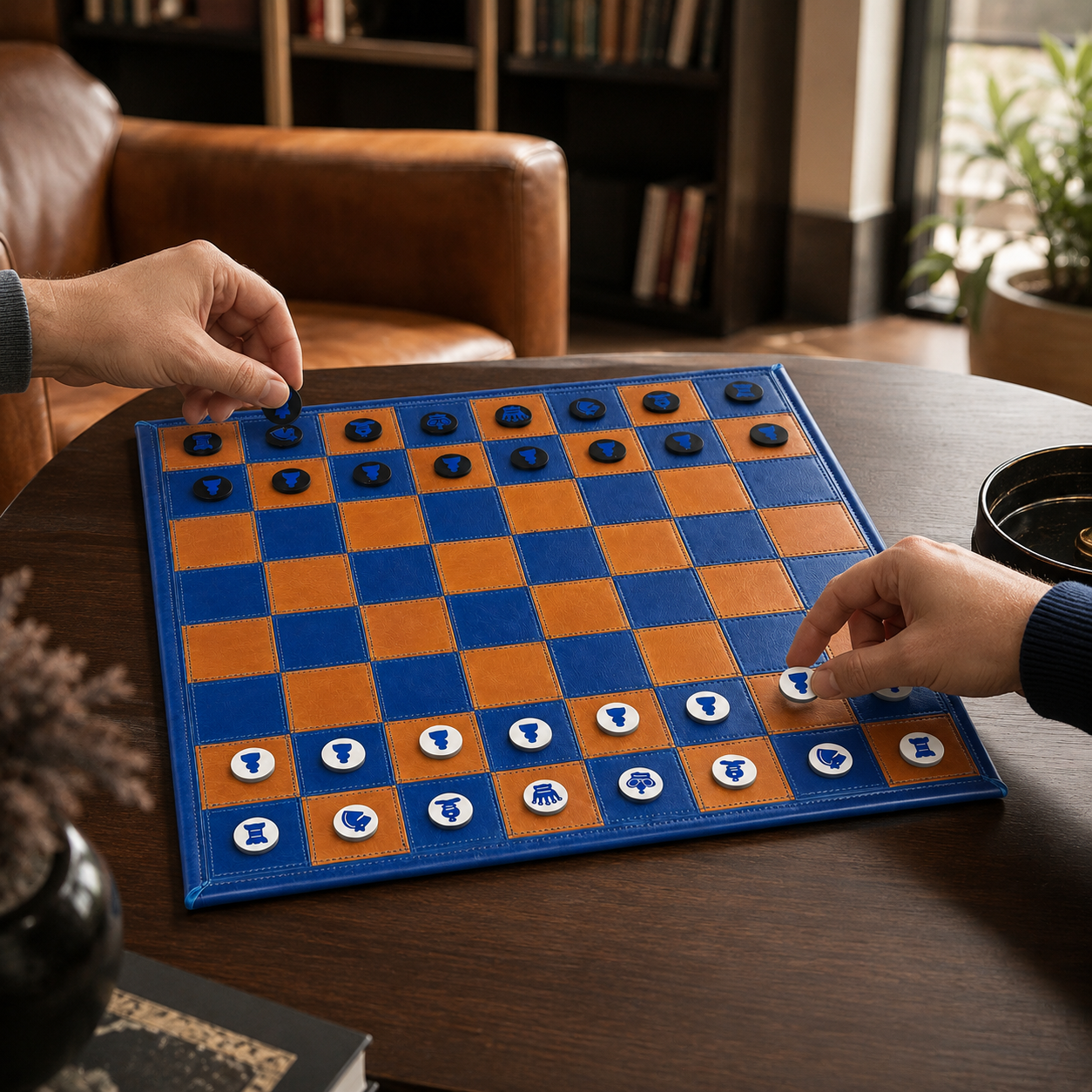 Leather chess set being enjoyed in an elegant lounge