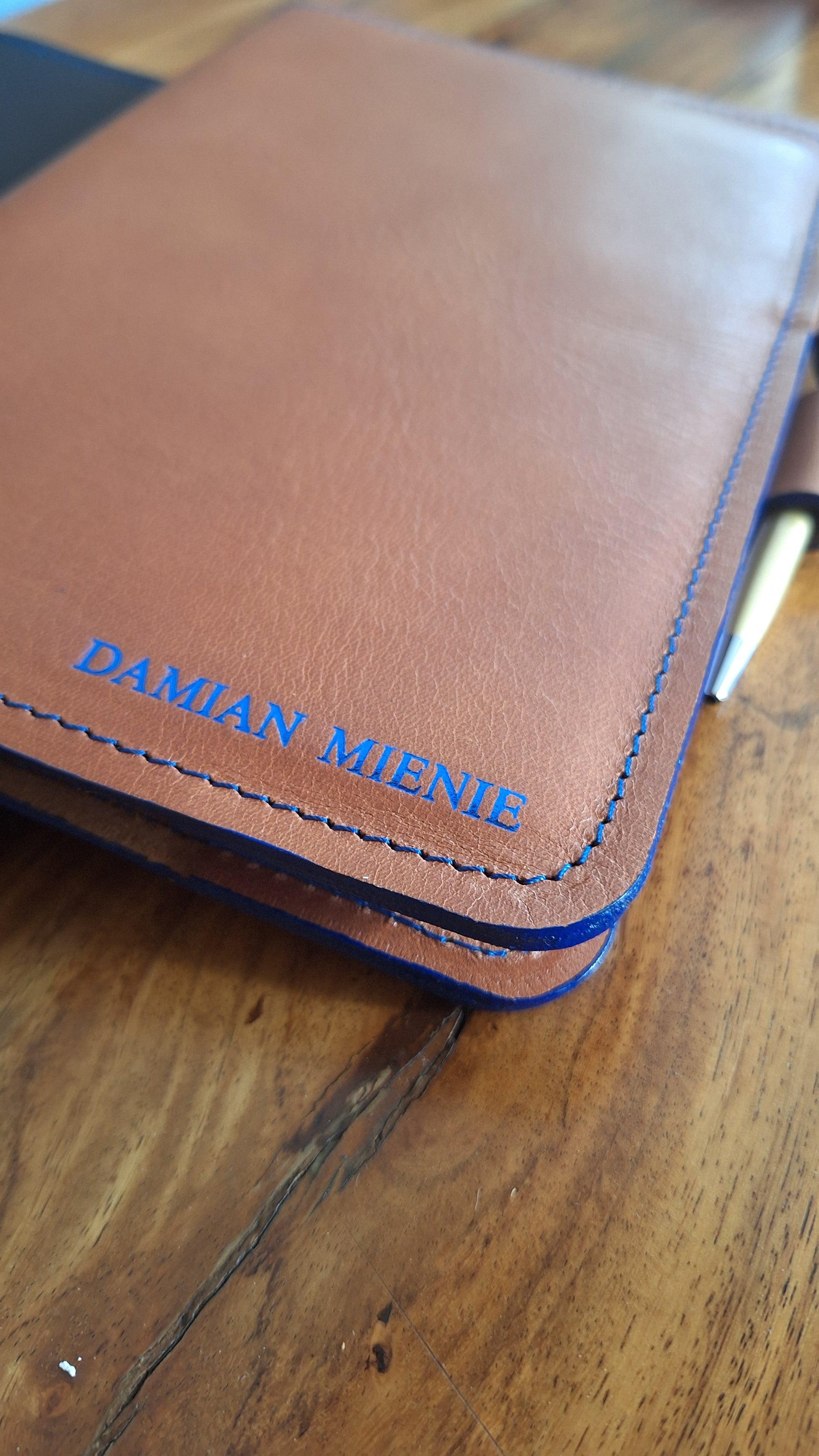 Leather corporate gift notebook cover with personalized name