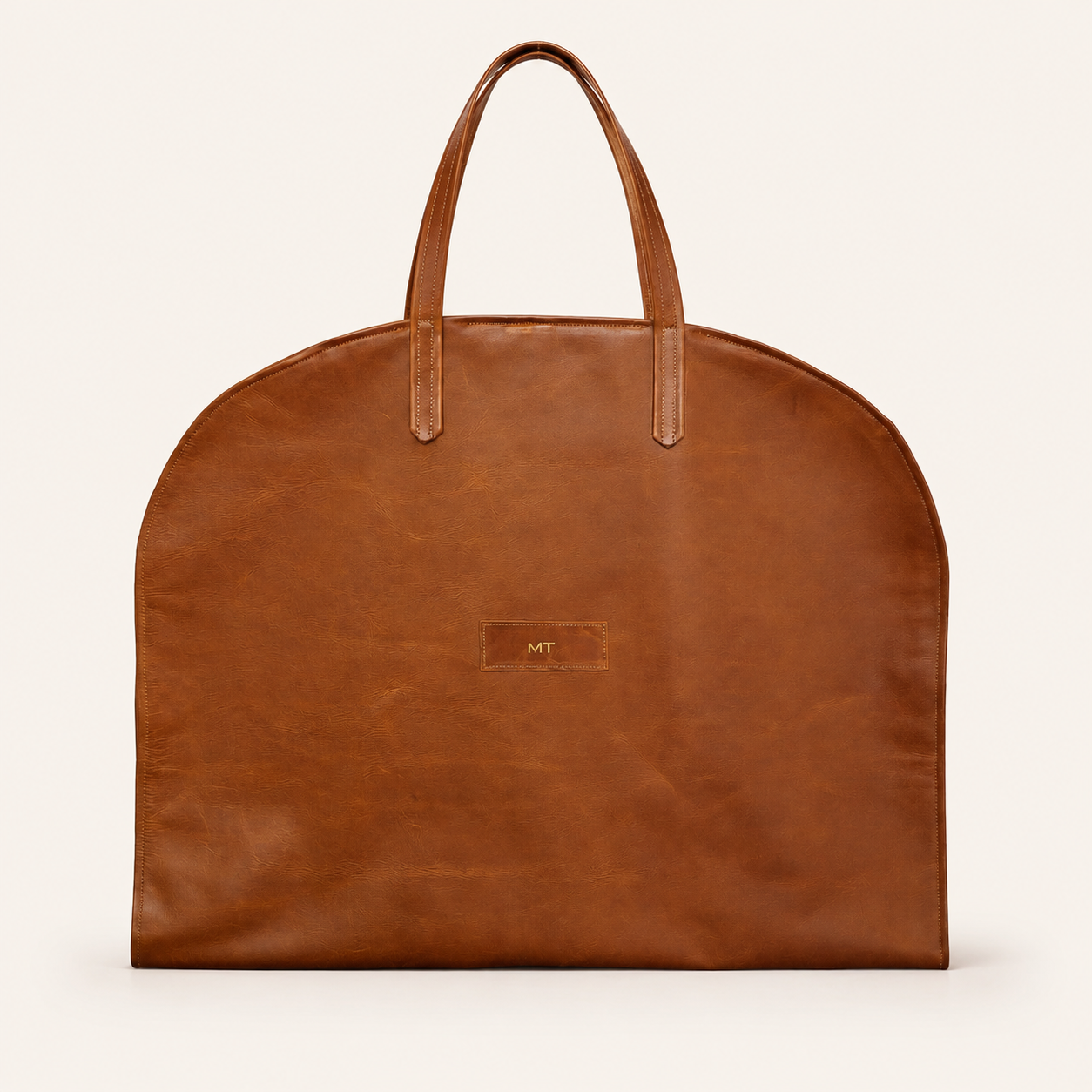 Personalised cognac tan leather suit carrier front view